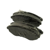Front three-quarter view of two shrink-wrapped brake pads stacked, showing the curved outer abutment profile and Bosch stamping