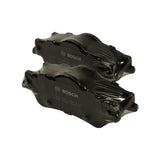Three-quarter angled view of the two shrink-wrapped pads stacked, Bosch branding and moulded part numbers visible on backing plates