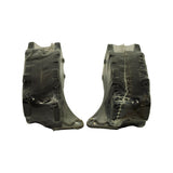 Edge-on view of both pads showing friction material thickness and backing plate profile through clear shrink wrap