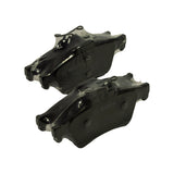 Overhead view of the pair of pads out of the box, wear-indicator clip and Bosch branding on the backing plates visible