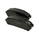 The two pads stacked and shrink-wrapped, backing plate facing camera, Bosch logo and part number printing clearly legible.
