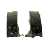 Side-on view of two wrapped pads standing upright, showing friction lining thickness, chamfered edges, and a sprung metal wear indicator clip on the left-hand pad