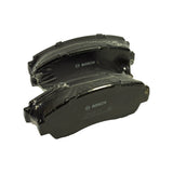 Three-quarter angle of the stacked pair showing full pad outline including the protruding mounting tabs/ears and the back-plate face markings