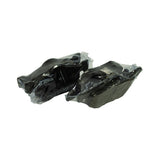 Two bagged pad pairs arranged showing backing-plate stampings and opposing friction-material faces of the complete axle set