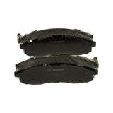 Two pads stacked face-to-face in shrink wrap, clearly showing curved 'ear' tabs at each end and stamped Bosch markings on backing plate