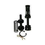 All kit components spread on white background: large piston assembly with integrated spring (top right), smaller secondary piston assembly (top left), separate loose coil spring (bottom left), circlip (bottom centre), and cotter/R-pin (bottom centre). Top-down view showing full kit scope.