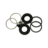 Alternate overhead layout of same kit components: two spring clips (gold-coloured), two flanged rubber dust boots, two flat rubber piston seal rings, one bleed screw cap, and two small flat washers.