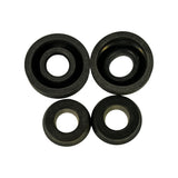Top-down view of same four cups repositioned: two large cups showing concave bowl face (upper), two smaller cups showing concave bore face and rubber flange (lower). Slight surface texture variation between large and small pairs visible.