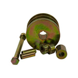 Front face of the pulley showing the central bore with rectangular keyway slot, surrounded by smooth machined hub face; bolt and remaining bushes/sleeves arranged below