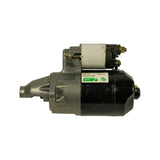 Starter motor, left-side profile view. Lucas label clearly readable: 'LRS 720 / 0080502 / 028000-9490 / Made in Japan / Lucas'. Black painted motor body, cast aluminium centre bracket and nose housing, solenoid terminals visible at top.