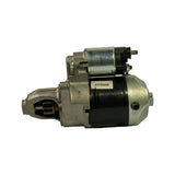 Rear-left three-quarter view of starter motor. Solenoid cap, main battery terminal stud, and trigger spade visible. Field housing clearly shows RXS508 sticker. Intermediate bracket casting shows faint marking consistent with 'ARC5' or similar batch code.