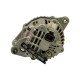 Rear connector-end view showing rectangular multi-pin regulator connector (brown/black housing), brush holder assembly, B+ terminal stud bottom centre with nut, and upper mounting ear. Regulator label partially visible. Part number visible on cap of centre cover.