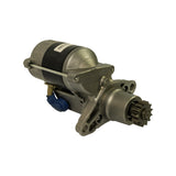 Three-quarter rear-left view showing the opposite side of the motor to photo 2 — reveals the second mounting lug, the blue terminal cap on the solenoid, and the pinion extending to the right. LRS1589 sticker on motor body partially visible.
