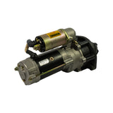 Three-quarter view from commutator end, NIKKO rear cap and terminal block visible at bottom-left. Solenoid WARNING label and braided earth strap visible at top. Spec label on motor body facing camera.