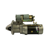 Three-quarter rear-left view showing solenoid assembly detail with terminals and copper strap. OEX label visible on field housing. Two long through-bolts run length of motor body. Rear commutator end cap with central boss visible.