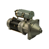 Three-quarter front-right view showing drive-end nose cone profile and right side of solenoid. Through-bolts and main terminal stud visible. Field housing two-piece construction visible.