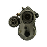 Nose/drive-end face of starter body without drive assembly fitted, showing OSGR internal reduction gear cavity, main bore, brush holder terminals, and solenoid plunger port.