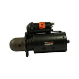 Opposite three-quarter view showing solenoid terminals and return spring clip; Wilson label readable as '12V V44'; rear shaft stub visible at right end of motor body