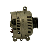 Opposite side profile showing 3-pin rectangular connector plug (grey/brown), B+ stud with red cap, lower mounting ears, and casting code 210-5210 on stator ring. Serpentine pulley visible at right.
