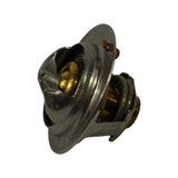 Opposite-side three-quarter angle showing the valve dome head open profile and underside of flange, with coil spring and brass pellet housing visible below. Part appears unused with no corrosion.