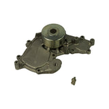 Three-quarter rear view of bare water pump body showing 'GMB JAPAN' casting on housing, central bearing hub with pressed steel cap, multiple threaded mounting bosses, and a small brass bleed/drain fitting alongside the pump