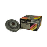 Part removed from box alongside original packaging; box top shows 'HEAVY DUTY FAN CLUTCH' and 'NON-THERMAL' printed on spine; both box and clutch shown together confirming unit is NOS removed from box for photography.