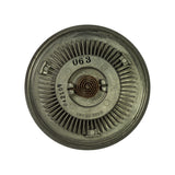 Rear face of fan clutch, overhead view, clearly showing '063' and '042109' centre stampings, 'MADE IN USA' casting, bi-metal thermostatic coil spring, and three small mounting pins on inner disc plate.