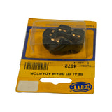 Card inverted, showing underside of the adaptor through the blister with the three flat blade contacts clearly visible, barcode and part number legible upside-down