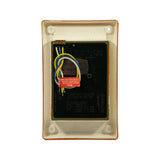 Rear of module. Black electronics housing with wiring harness — three leads (white, yellow, blue). Moulded text reads 'LED Multivolt by Hella / Made in New Zealand' and 'Indicator Module / Multivolt 9-33 Volt'. Blue label partially visible reads 'Generation II / Rear Turn Signal'. Red warning sticker: 'Note: Please read wiring instructions before connecting this cable'. Wiring colour code chart visible: White = Negative (−), Yellow = Indicator (+) 8 watts, Blue = Indicator (+) 8 watts / +trigger