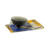 Three-quarter angled view of blister pack from right side, showing depth of the disc horn within the bubble. Horn terminals (blade connectors and mounting bolt) visible at base. Packaging shows age-related yellowing and minor soiling.