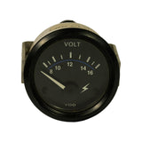 Front face of VDO 52mm voltmeter showing black dial with white scale markings from 8 to 16 volts, blue normal-range arc, lightning bolt symbol, and VDO brand name at bottom. White pointer at rest.