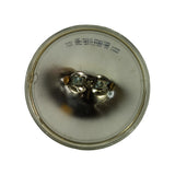 Rear of lamp showing silver reflector dome and two brass screw terminals. Text stamped around upper perimeter: 'GE 4413 TRACTOR / 12V 35W 07-11-01 13 1500'. Minor surface tarnish on terminal hardware; reflector in good order.