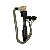 Column-end view showing metal mounting bracket/clip and split 11-pin flat connector. Wire harness exits from both sides of bracket.