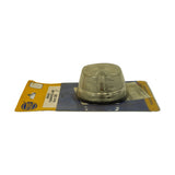 Three-quarter front-left view. Hella logo and label visible on card, ribs of clear lens prominent, rubber gasket visible around base perimeter.