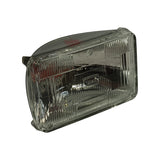 Three-quarter front/side angle view of lamp without box; full extent of rectangular glass envelope visible with moulded lens ribs; red STANLEY markings on chrome reflector readable at top.