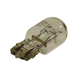 Angled side view of bulb with wedge base at left, etched text 'KOITO 12V 21/5W 7443' and code '8902' visible on the glass