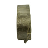 End-on view of the sleeve stack showing the thickness of the shells and the locating tabs pressed into the parting edges