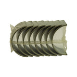 Top-down view of eight bearing shells nested in shrink wrap, consistent with a four-cylinder conrod set of four pairs