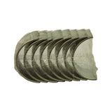 Opposite side view of the sealed set showing the oil groove and oil-hole detail on the inner bearing surfaces through the clear wrap.