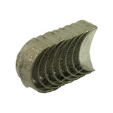 Angled top-down view of the sealed set showing all shell pairs nested together with the locating tangs lined up along one edge.