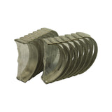 Set laid out showing all bearing halves together — upper and lower shells separated into two groups, still factory-wrapped in plastic