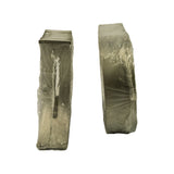 Profile side-on view of the wrapped bearing shells showing bearing wall thickness and flanged thrust shoulder on one set