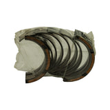 Bearing set laid flat in sleeve showing full run of shells including flanged thrust bearings with copper-coloured sides and plain intermediate shells