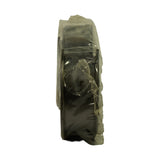 End-on view of the sealed sleeve showing stacked shell edges and an oil feed hole through the outermost shell