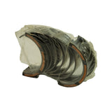 Side-on view showing the grooved oil channels on the upper shell halves and plain running surface on the lower halves