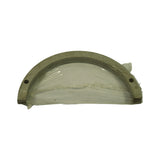 Front face of stacked thrust washers laid flat, showing the full semi-circular profile. Two small location/oil holes visible near each end of the flat edge. Parts still sealed in plastic wrap, alloy bearing face upward.