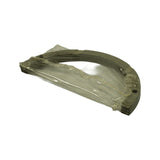 Edge-on view of the thrust washer stack showing the semi-circular cross-section profile and uniform thickness. Oil feed grooves or serrations visible along the outer curved rim. One location hole visible on right end.