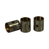 Three bushes showing axial split seam, bronze inner surface, and single oil hole through the wall