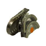 Angled view of the bearing stack highlighting the orange size-grade dot on the upper bearing and the serrated thrust-flange edges on the lower pair