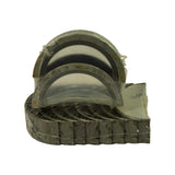 Front view of the stack showing the polished aluminium running surface of an upper shell sitting on top of the flanged thrust bearing half